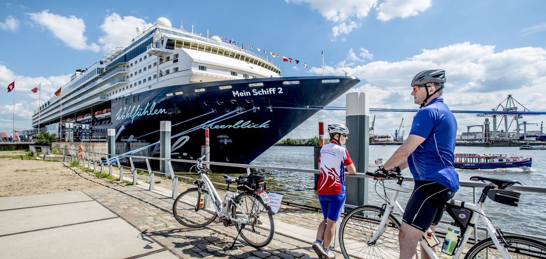 Das Rad neu erfinden: Fahrradfahrer am Hafen